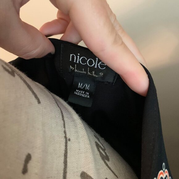 Women's Medallion Dress by Nicole Miller with a Slight Upper Split on the Chest - Picture 10 of 11